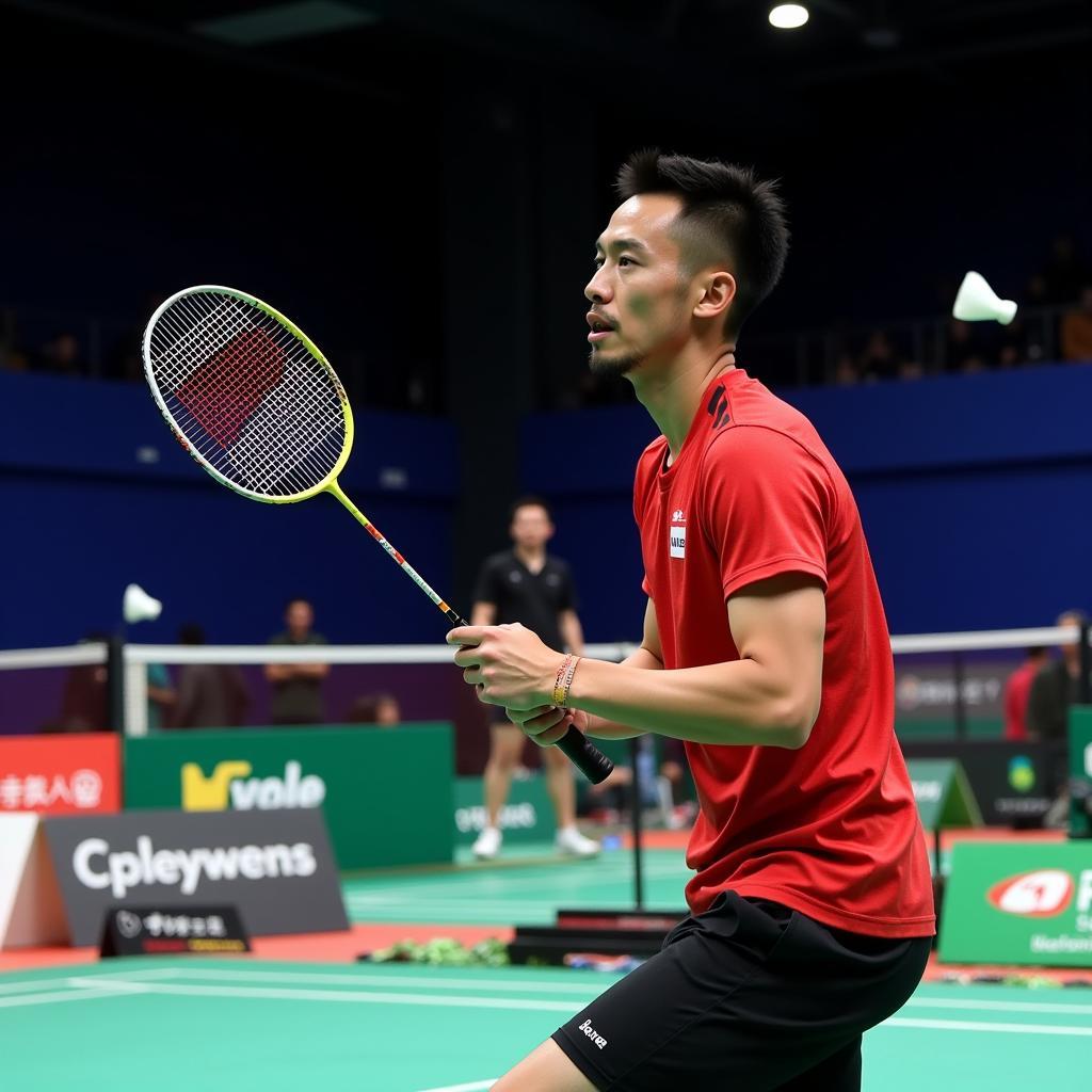 Lin Dan cầm vợt cầu lông trên sân đấu